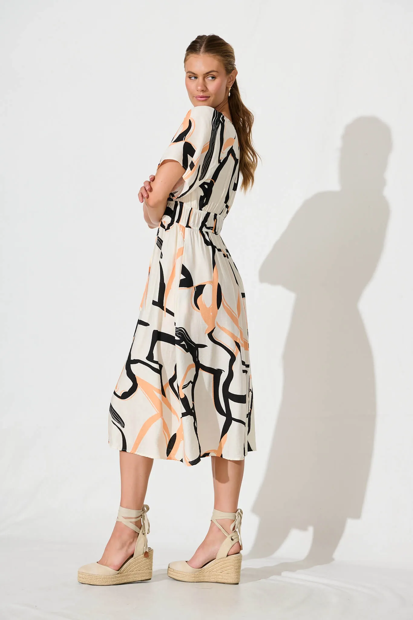 Bindi Midi Dress In Beige With Black Print