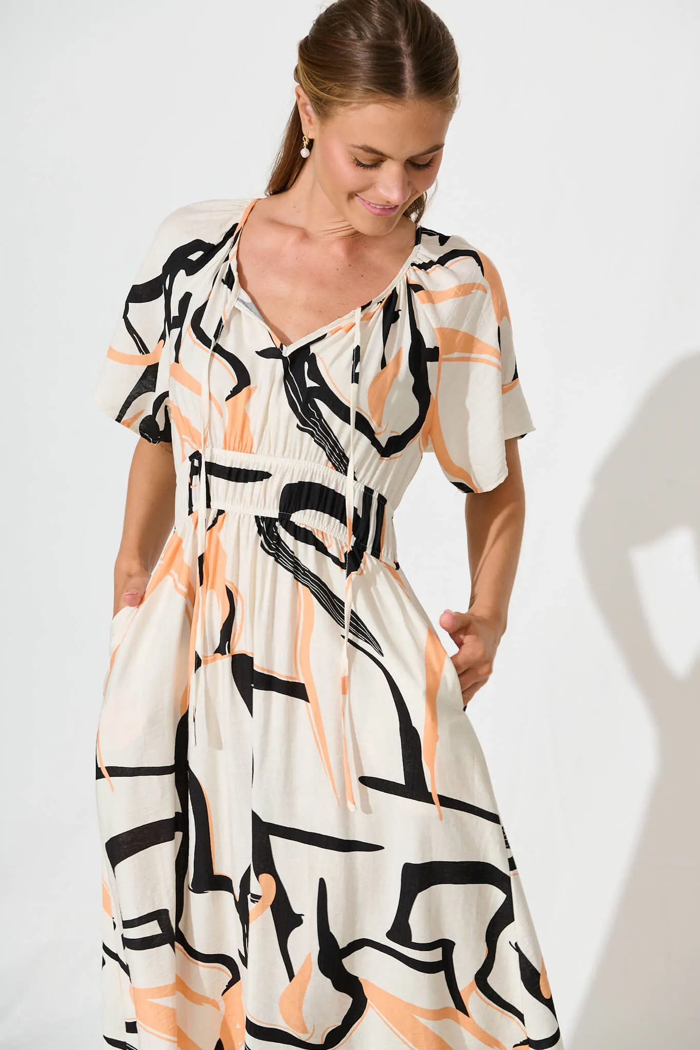 Bindi Midi Dress In Beige With Black Print