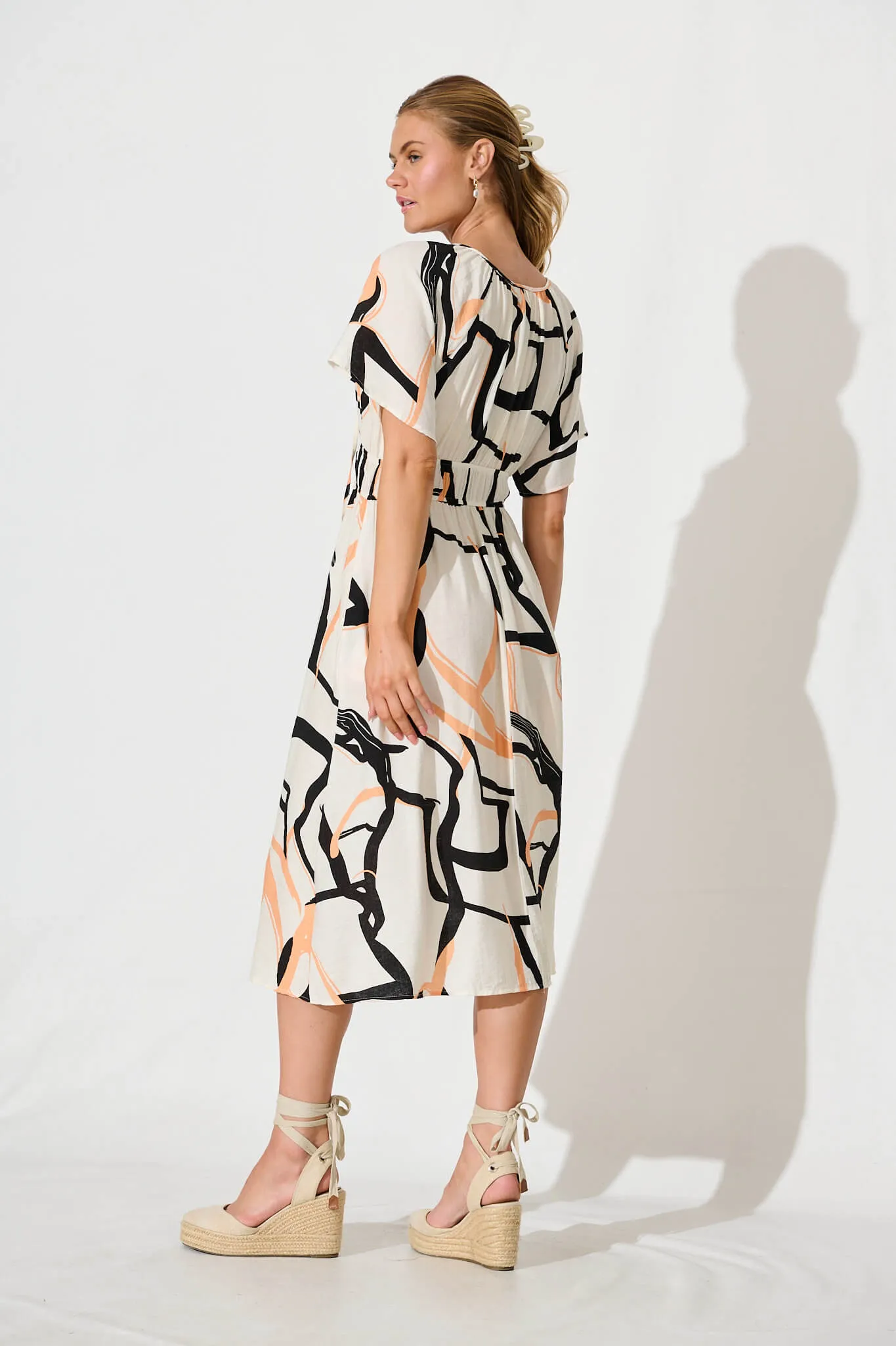Bindi Midi Dress In Beige With Black Print