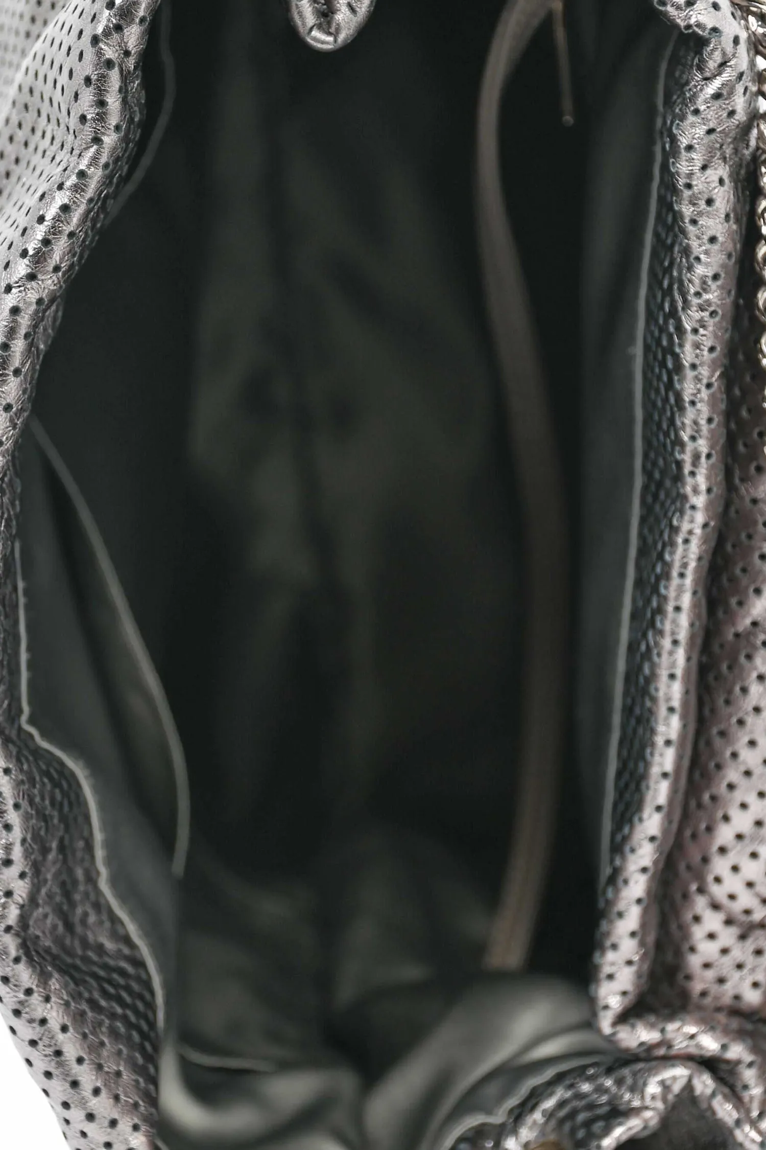 Pre-Loved Chanel™ Grey Metallic Perforated Leather 'Drill' Large Hobo Bag